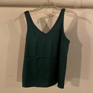 Emerald green satin tank top. Really perfect but just doesn't fit me.